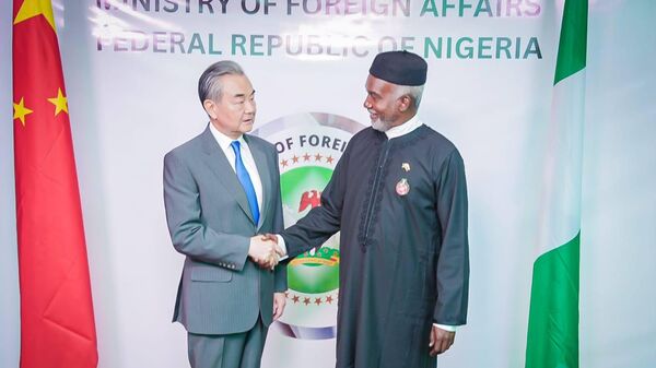  Chinese Foreign Minister Wang Yi with his Nigerian counterpart Yusuf Tuggar. - Sputnik Africa