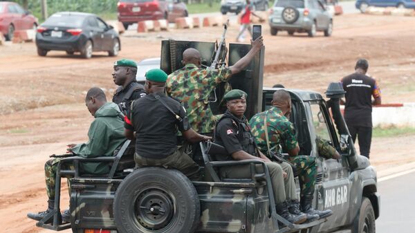 ABUJA, NIGERIA - AUGUST 01: Nigerian security forces take measures during a demonstration by hundreds over high cost of living and removal of fuel subsidies in Abuja, Nigeria on August 1, 2024.  - Sputnik Africa