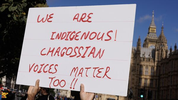 British Chagossians demonstrate in Westminster asking for the right to determine their own future on October 07, 2024 in London, England.  - Sputnik Africa