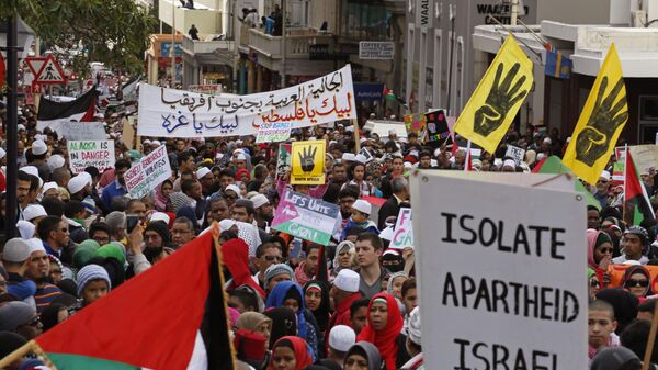 Palestinian supporters take part in a rally against the Israeli occupation of the Palestinian territories in Cape Town, South Africa. - Sputnik Africa