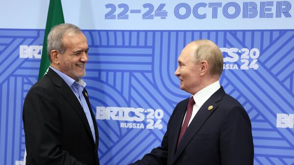 Russian President Vladimir Putin and Iranian President Masoud Pezeshkian during a meeting as part of the 16th BRICS summit in Kazan. - Sputnik Africa