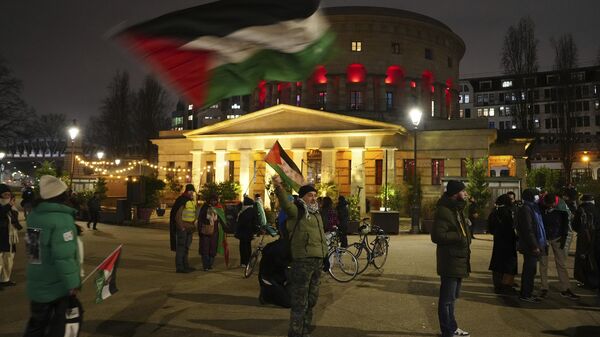 People gather to celebrate a long-awaited ceasefire that would pause the fighting in the Gaza Strip. - Sputnik Africa