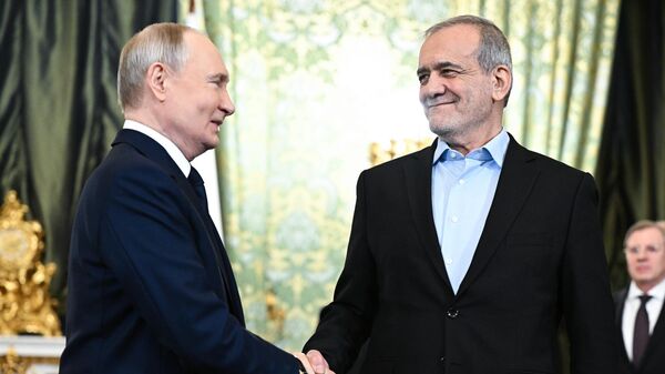 Russian President Vladimir Putin during a meeting with Iranian President Masoud Pezeshkian. - Sputnik Africa