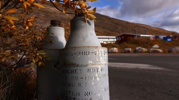 KANGERLUSSUAQ, GREENLAND - SEPTEMBER 09:  Discarded auxiliary rocket engines once used by the U.S. military are displayed on a roadside on September 09, 2021 in Kangerlussuaq, Greenland. - Sputnik Africa