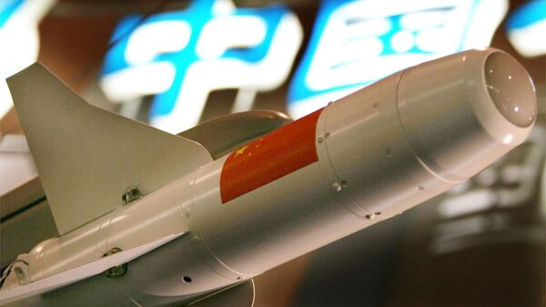 A Chinese air-to-air missile is on display  in front of Chinese characters saying 'China' Monday, Nov. 1, 2004, at the fifth China Air Show in Zhuhai, China. This  bi-annual show takes place from November 1 to 7. - Sputnik Africa