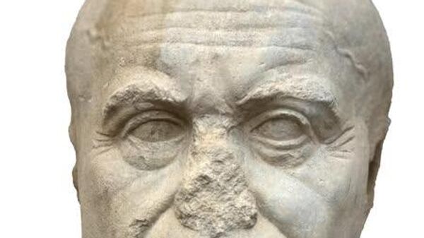 A large marble head found at Taposiris Magna, Egypt. - Sputnik Africa