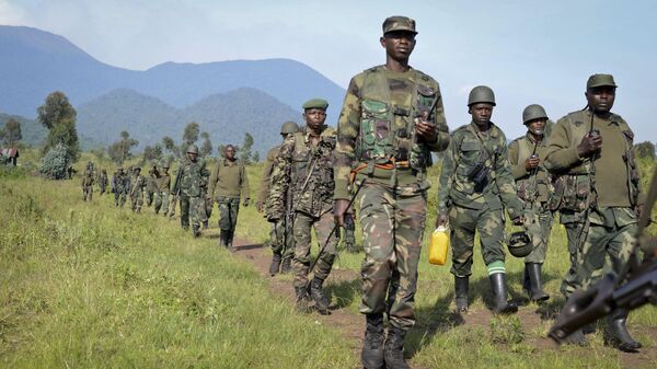 Congolese army soldiers, about 25 km from the provincial capital Goma, in eastern Congo, on Sunday, October 27, 2013. - Sputnik Africa