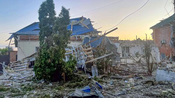 This photo released by the acting Governor of Kursk region Alexei Smirnov telegram channel on Tuesday, Aug. 6, 2024, shows a damaged house after shelling by the Ukrainian side in the city of Sudzha, Kursk region that borders Ukraine. - Sputnik Africa