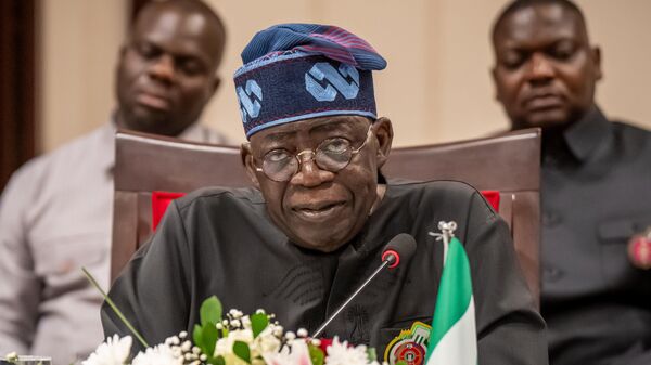 Bola Tinubu, President of Nigeria, attends a press conference at State House. - Sputnik Africa