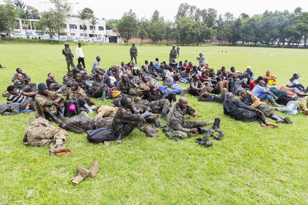 KIGALI, RWANDA - JANUARY 27: Some Democratic Republic of Congo (DRC) army forces, who fled the region due to the clashes crossed into Rwanda through the Corniche border crossing between the DRC and Rwanda, surrender to Rwandan forces in Kigali, Rwanda on January 27, 2025. Civilians and some United Nations (UN) officials who fled the region due to the clashes crossed into Rwanda through the Corniche border crossing between the Democratic Republic of Congo (DRC) and Rwanda. More than 400,000 people have been displaced since the beginning of the year due to ongoing violent clashes between the March 23 Movement (M23) rebel group and security forces near Goma, the capital of North-Kivu province in eastern Democratic Republic of Congo (DRC). (Photo by Cyrile Ndegeya/Anadolu via Getty Images) - Sputnik Africa