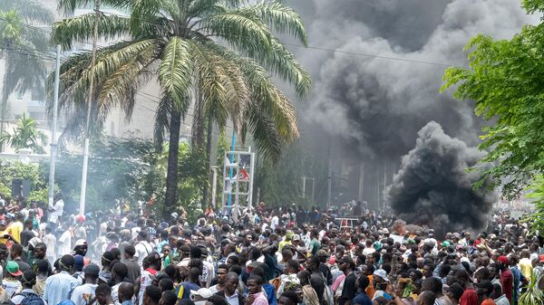 M23 rebels gather for large-scale protests as they set on fire the Rwandan, French, Belgian and Kenyan embassy buildings and loot some shopping centers during anti-Rwandan demonstrations allegedly supported by the rebel group March 23 Movement (M23) and rebels in Kinshasa, the capital of the Democratic Republic of Congo on January 28, 2025.  - Sputnik Africa