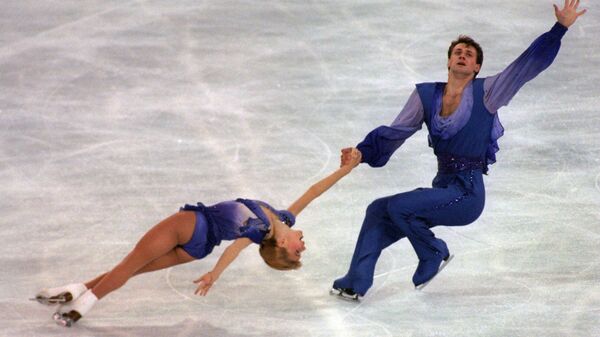 EVGENIA SHISHKOVA AND VADIM NAUMOV OF RUSSIA PERFORM THEIR PAIRS FREE SKATING ROUTINE DURING THE WORLD FIGURE SKATING CHAMPIONSHIPS AT THE NATIONAL INDOOR ARENA IN BIRMINGHAM, ENGLAND.  - Sputnik Africa