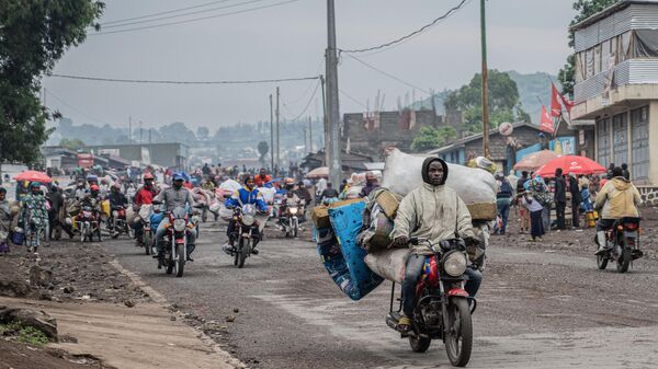 Congolese civilians fleeing the clashes in the Goma city of the DRC's North Kivu province. - Sputnik Africa