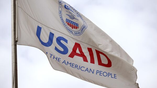 A flag outside the US Agency for International Development (USAID) headquarters is seen on February 03, 2025 in Washington, DC. - Sputnik Africa