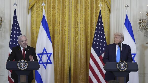 Israeli Prime Minister Benjamin Netanyahu speaks during a news conference with President Donald Trump in the East Room of the White House, Tuesday, Feb. 4, 2025, in Washington. - Sputnik Africa