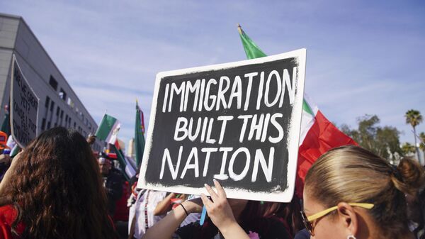 People take part in 'A Day Without Immigrants' march, protesting mass deportations in downtown Los Angeles, California, United States on February 3, 2025.  - Sputnik Africa