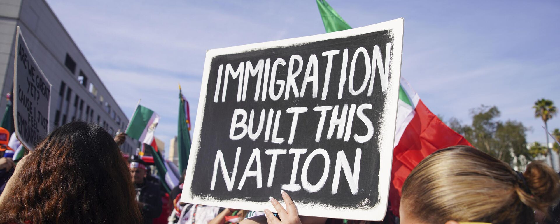 People take part in 'A Day Without Immigrants' march, protesting mass deportations in downtown Los Angeles, California, United States on February 3, 2025.  - Sputnik Africa, 1920, 06.02.2025