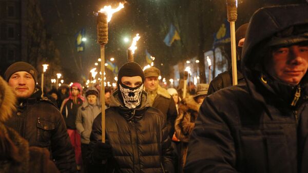 Ukrainian Neo-Nazis carry burning torches during a rally in downtown Kiev, Ukraine, Friday, Jan. 1, 2016, to commemorate the 1909 birth anniversary of notorious Ukrainian political activist and national independence leader Stepan Bandera - Sputnik Africa