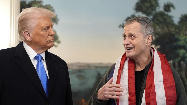 President Donald Trump, accompanied by Marc Fogel, speaks in the Diplomatic Reception Room at the White House, Tuesday, Feb. 11, 2025, in Washington.  - Sputnik Africa