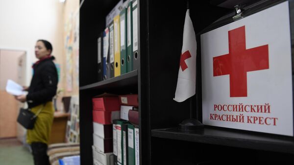 An evacuated resident of Donbass at the Kirov district branch of the Russian Red Cross in Rostov-on-Don. - Sputnik Africa