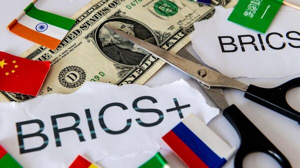 A dedollarisation concept with the words and country flags of the block of BRICS and BRICS+ countries, a pair of scissors and a US dollar bill. - Sputnik Africa