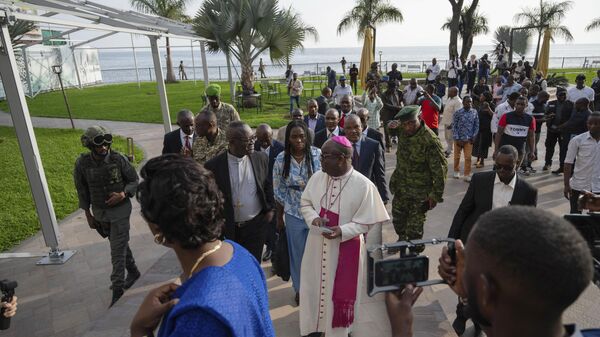 Members of the National Episcopal Conference of Congo and the Church of Christ arrive for a meeting with the leader of the political military coalition in Goma, Democratic Republic of the Congo, Wednesay, Feb. 12, 2025.  - Sputnik Africa