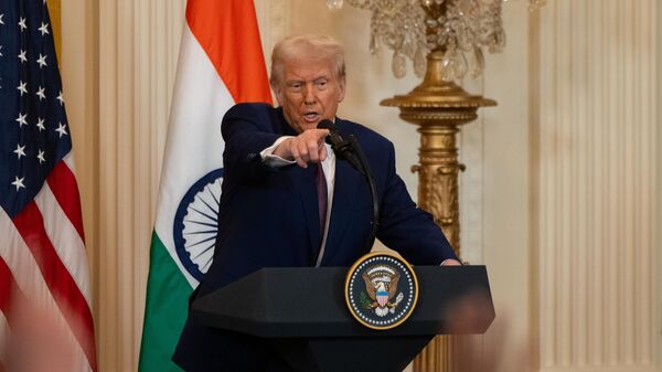  Indian Prime Minister Narendra Modi and US President Donald Trump hold a joint press conference in the East Room of the White House in Washington DC, United States on February 13, 2025. - Sputnik Africa