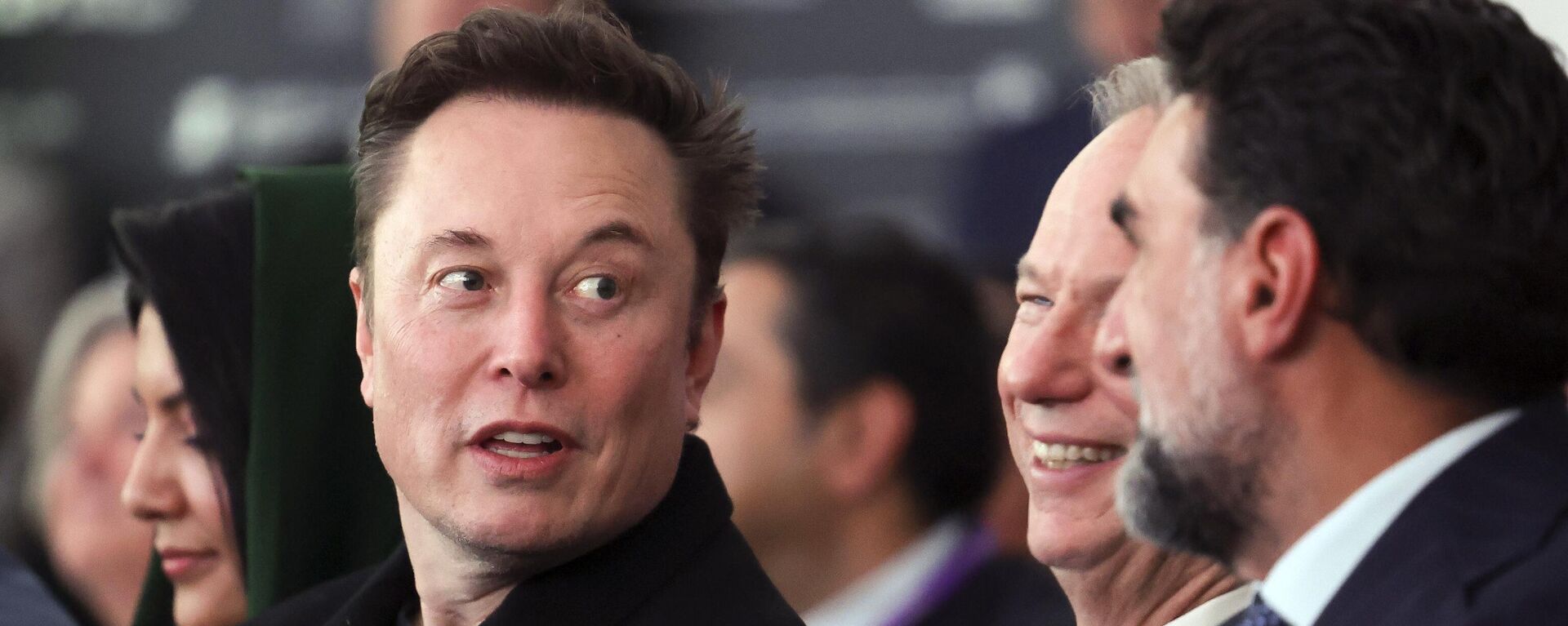 Elon Musk arrives before President Donald Trump speaks at the Future Investment Initiative (FII) Institute summit in Miami Beach, Fla., Wednesday, Feb. 19, 2025.  - Sputnik Africa, 1920, 20.02.2025