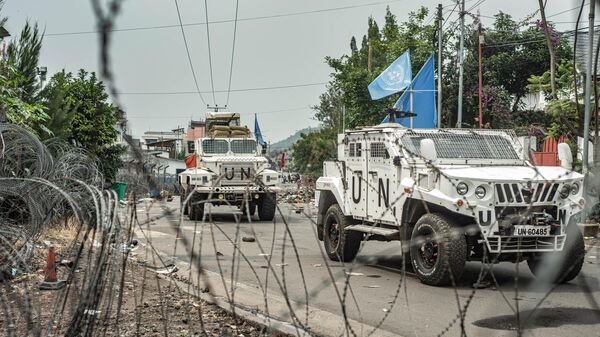 United Nations MONUSCO vehicles drive in a street lined with barbed wire on January 30, 2025 in Goma, Democratic Republic of Congo.   - Sputnik Africa