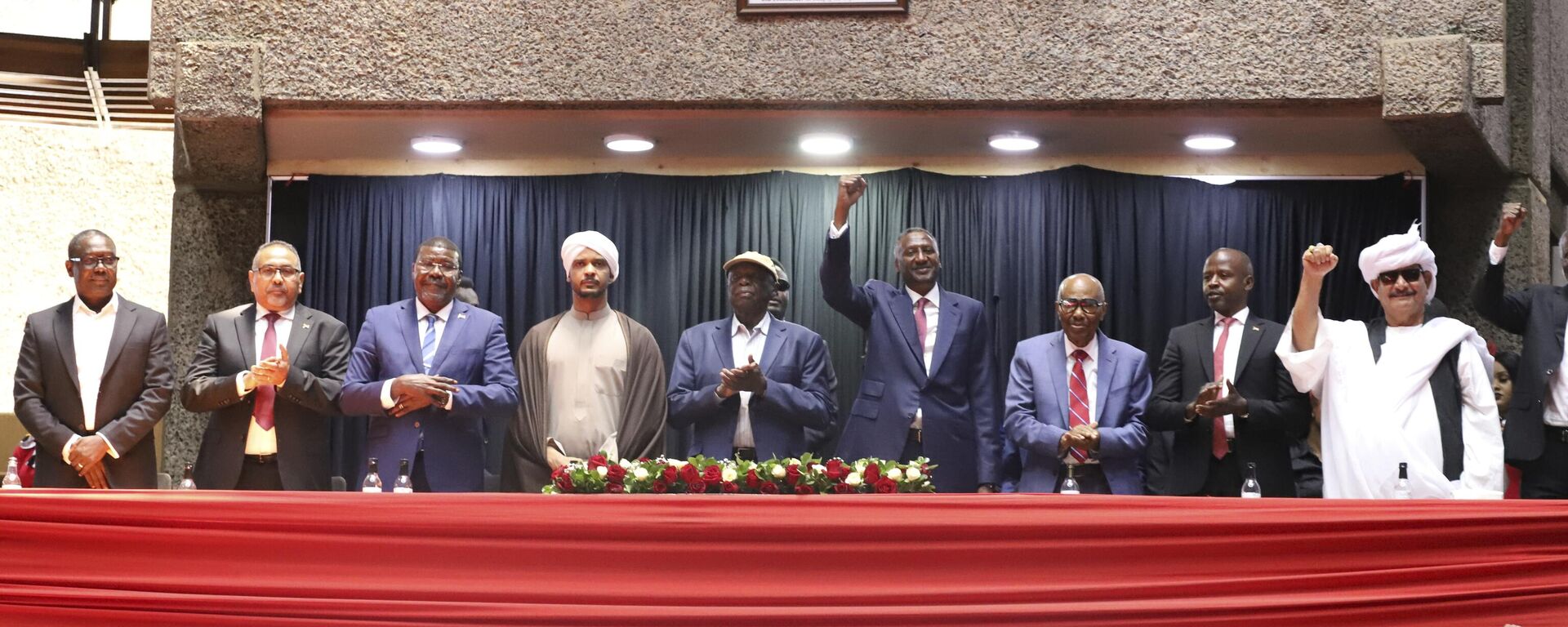 Representatives of Rapid Support Forces (RSF) sing during a planned signing ceremony of the Sudan Founding Charter aimed at establishing a unity government involving leaders of political forces, armed groups, and the Rapid Support Forces (RSF) at the Kenyatta International Convention Centre (KICC) in Nairobi, Tuesday, Feb. 18, 2025. - Sputnik Africa, 1920, 20.02.2025