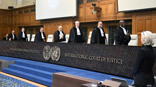 Judges take their seats prior to the hearing of Israel's defense at the International Court of Justice (ICJ) against South Africa's genocide case in Gaza against Israel on January 12, 2024, in the Hague, Netherlands. - Sputnik Africa