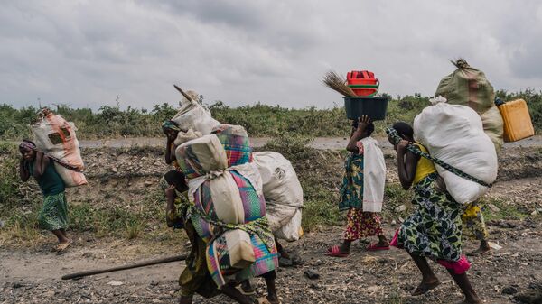 Groups of displaced civilians moving on foot back to their home villages on February 12, 2025 in Goma, Democratic Republic of Congo.  - Sputnik Africa