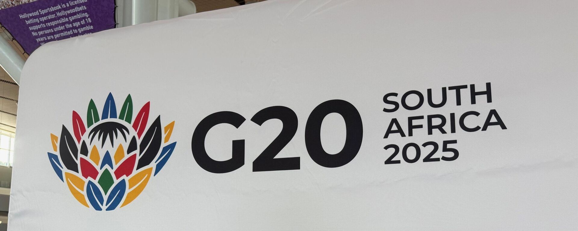 Before the G20 foreign ministers' meeting in Johannesburg. A banner at Cape Town airport welcomes G20 participants. - Sputnik Africa, 1920, 22.02.2025