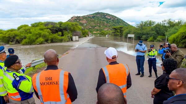 Botswana's President Duma Gideon Boko visits flood-affected sites in Gaborone and surrounding areas to witness firsthand the severe impact of the devastating floods on our communities. February 20, 2025. - Sputnik Africa