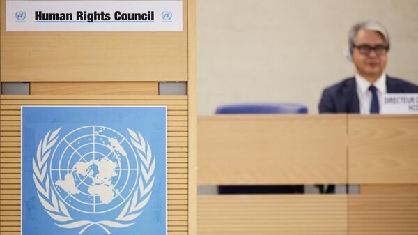 A lectern with the UN logo stands in the hall during the 55th session of the United Nations Human Rights Council. The focus of the opening of the spring session is on wars, conflicts and tensions. February 26, 2024, Switzerland. - Sputnik Africa