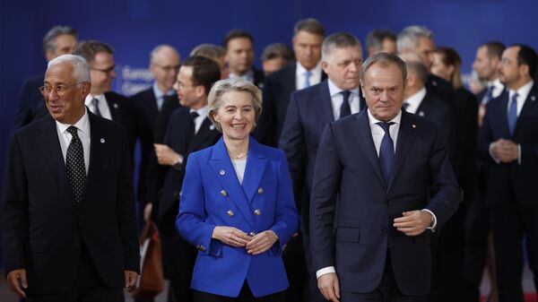 From left, European Council President Antonio Costa, European Commission President Ursula von der Leyen and Poland's Prime Minister Donald Tusk walk with other leaders prior to a group photo at an EU summit in Brussels, Thursday, Dec. 19, 2024. - Sputnik Africa