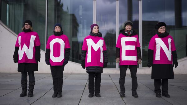 Women attend a protest marking International Women's Day, March 8, 2023, in Berlin, Germany - Sputnik Africa