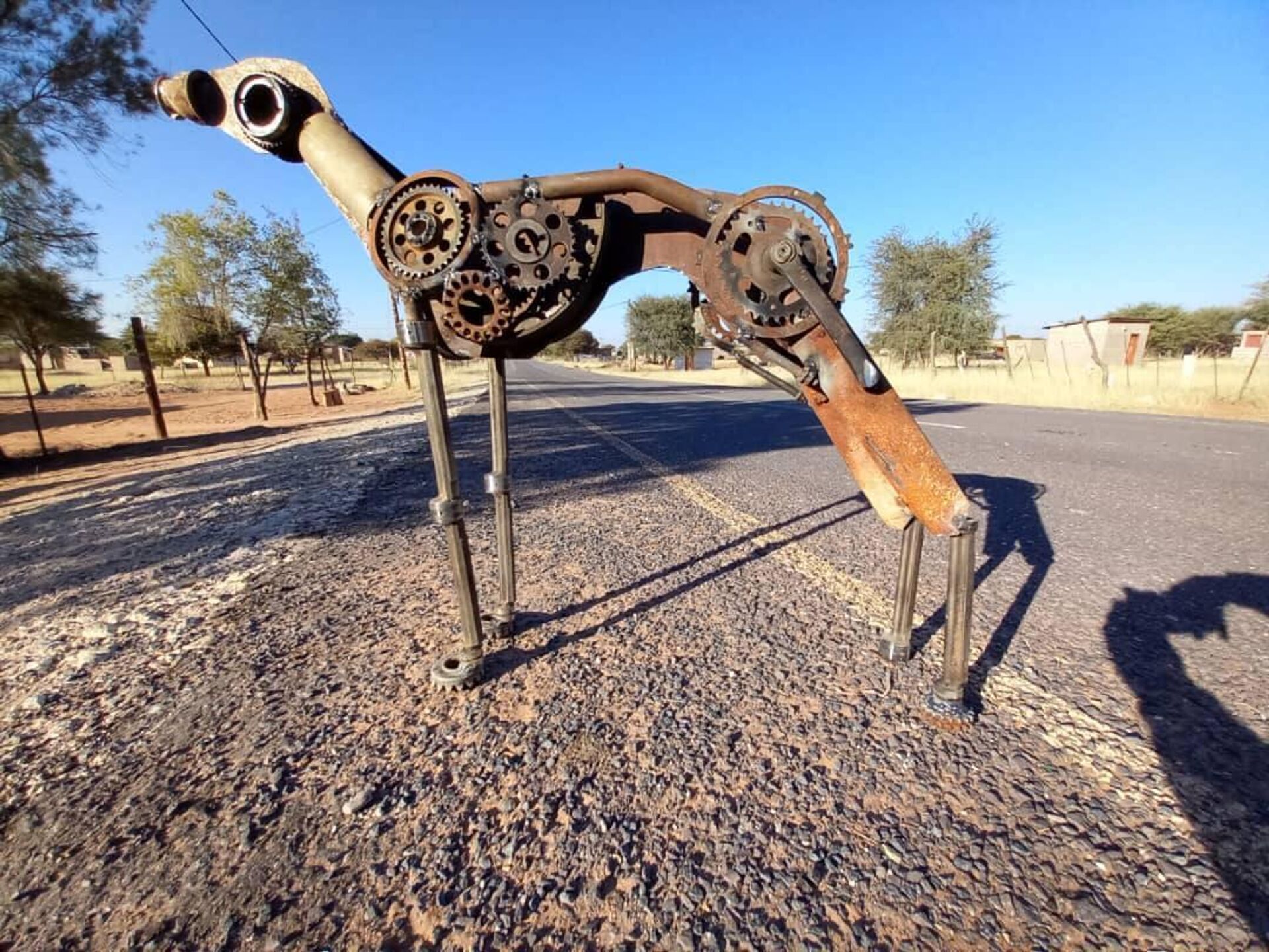 An artwork by Botswanan artist Charles Kakomee-Tjeja, who is known for his sculptures made from discarded metal pieces. - Sputnik Africa, 1920, 09.03.2025