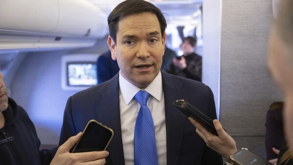 US Secretary of State Marco Rubio speaks with the media on his military airplane as he flies to Jeddah, Saudi Arabia, Monday, March 10, 2025. - Sputnik Africa