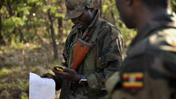 Ugandan soldiers of the Uganda People's Defence Force (UPDF) patrol through the central African jungle during an operation to hunt notorious Lord's Resistance Army (LRA) leader Joseph Kony.  - Sputnik Africa