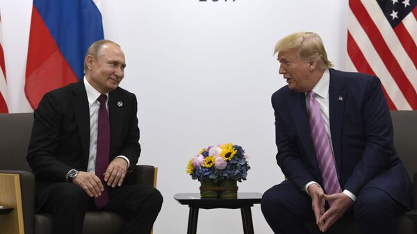 In this June 28, 2019, file photo, President Donald Trump, right, meets with Russian President Vladimir Putin during a bilateral meeting on the sidelines of the G-20 summit in Osaka, Japan. - Sputnik Africa