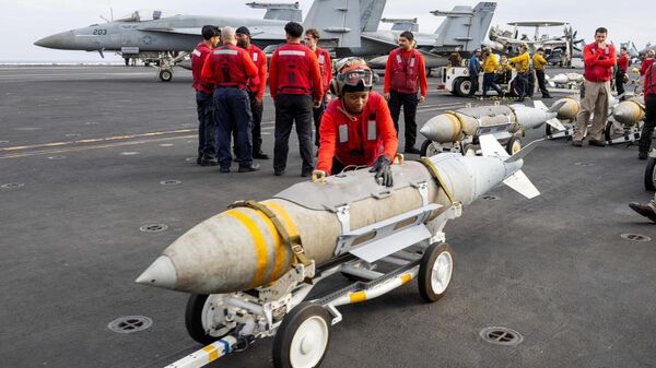 US Navy Aviation Ordnanceman assemble, transport, and install ordnance on aircraft aboard the Nimitz-class aircraft carrier USS Harry Truman (CVN 75) in the US Central Command area of responsibility. March 15, 2025. - Sputnik Africa