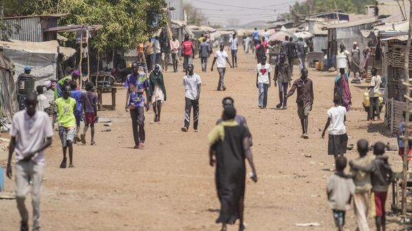 Internally displaced people walk along a street in Juba, South Sudan, Thursday, Feb. 13, 2025.  - Sputnik Africa