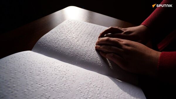 Une entrepreneuse malgache relève le défi de créer un appareil qui traduit tous types de texte en braille - Sputnik Afrique