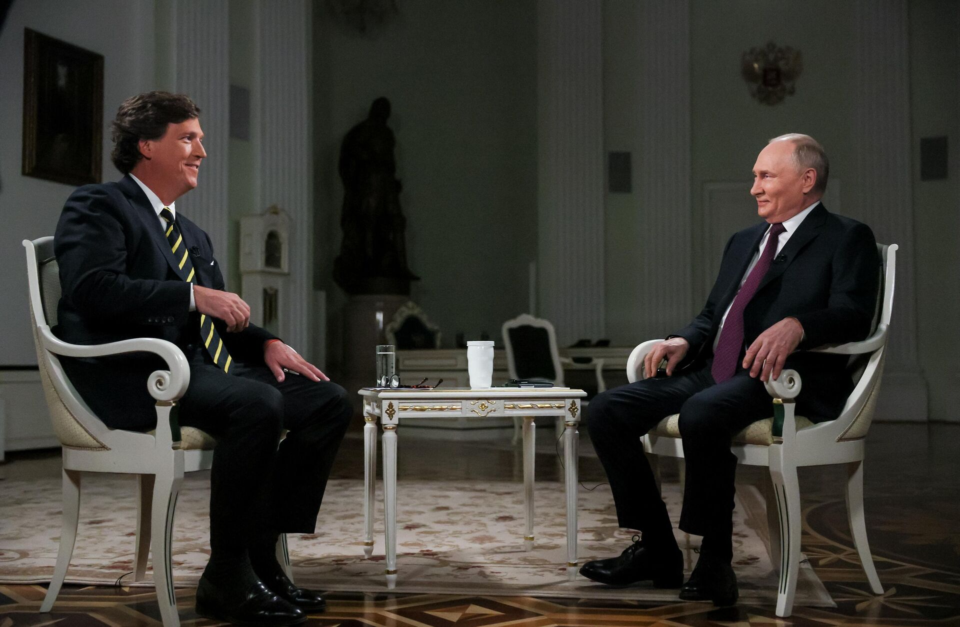 Russian President Vladimir Putin and US journalist Tucker Carlson. File photo Russian President Vladimir Putin and US journalist Tucker Carlson. File photo - Sputnik Africa, 1920, 07.05.2025
