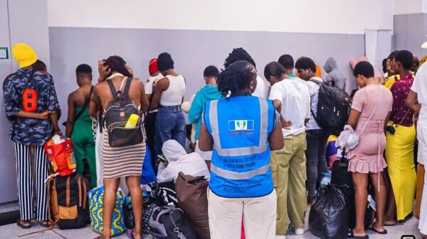 78 Nigerian Women & Children Rescued From Trafficking in Cote d’Ivoire Return Home - Sputnik Africa