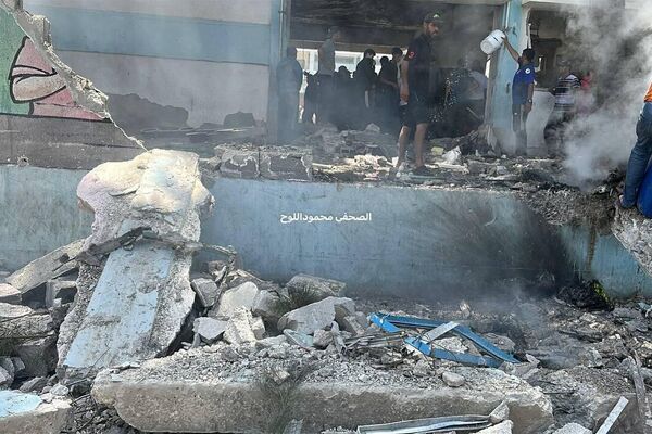 Israeli Airstrikes Hit Gaza School Sheltering Displaced Families, Causing Casualties Israeli Airstrikes Hit Gaza School Sheltering Displaced Families, Causing Casualties - Sputnik Africa