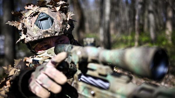 A sniper of the 56th Guards Airborne Assault Regiment of the 7th Guards Airborne Assault Division of the North Group of Forces of the Russian Armed Forces at a firearms training session in the Kursk Region. - Sputnik Africa