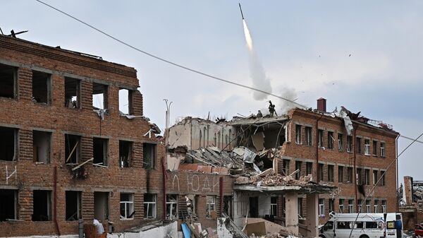 Russian Defense Ministry servicemen launch a man-portable air defense system missile in the town of Sudzha, Kursk Region. - Sputnik Africa
