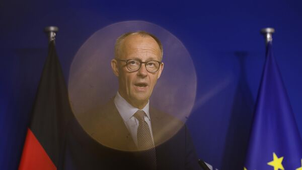Germany's Chancellor Friedrich Merz addresses the media at the European Parliament in Brussels, Friday, May 9, 2025. - Sputnik Africa